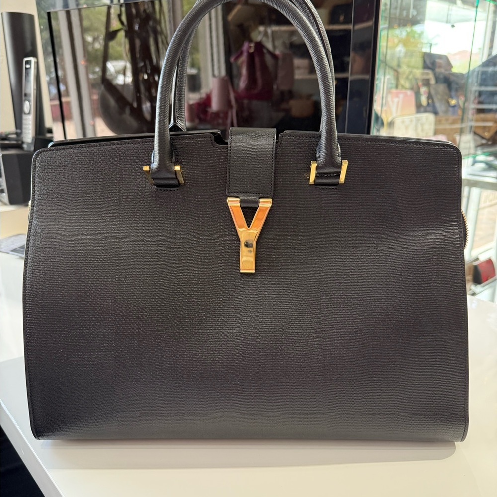 Yves Saint Laurent Elegant Black and Gold Accent Bag